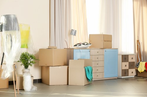 Professional team handling office equipment during a commercial move in Battersea