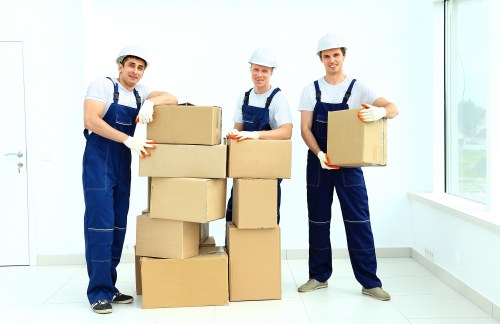 Experienced movers unloading items into a new commercial space in Battersea