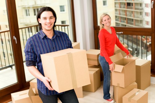 Customers preparing furniture for pick-up service in Battersea storage